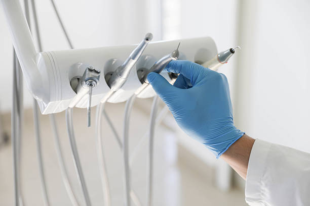 Professional Emergency Dentist technician working in Seacliff, CA